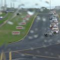 Rain during the safety car period produced a chaotic restart in the final Supercars race of the weekend in Sydney.