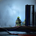 Arsonists are on the run after two cars were firebombed and a home set alight in Melbourne overnight.