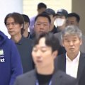 South Korea's playing squad are booed by fans at the airport when they return from the FIFA World Cup.