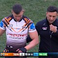 Alex Twal shows his anger as he leaves the field following a concussion.