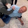 Footage of the incident shows two plainclothes officers leaving the man on the ground as walking off as bystanders gathered.