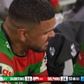 Latrell Mitchell struggles off the field late in the Rabbitohs' loss to the Dolphins.