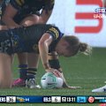 Abbi Church goes down injured after being caught awkwardly in a tackle.