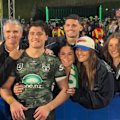 Warriors halfback Jett Cleary embraces his family, including dad Ivan and brother Nathan, after his NRL debut.
