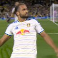James Justin whipped the cross in and big striker Dominic Calvert-Lewin connects with his head for a Newcastle own goal.