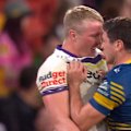 Mitch Moses is caught in a heated exchange with Josh King after a tackle.