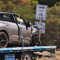 An elderly man is fighting for life after being caught up in a police pursuit crash so bad the car's engine was sent flying.