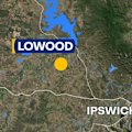 A woman is speaking with police after a child was found dead in a home west of Brisbane.