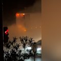 A smoking garbage truck has been forced to dump its flaming load in a long trail on busy Bell Street in Coburg, causing morning peak-hour traffic disruptions.