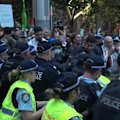 Protesters have clashed with police in Sydney, where a protest against Israeli President Isaac Herzog's visit has turned violent.