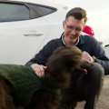 A dog owner has been reunited with his poodle after he was taken in a carjacking, driven more than 50 kilometres and dumped.