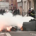 French police have halted the use of stun grenades at student protests after a teenage boy's hand was blown off.