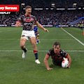 Roosters winger Billy Smith scores his second try against the Bulldogs.