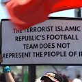 Demonstrators have gathered outside the Los Angeles stadium staging Iran's World Cup opener.