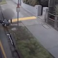 Dramatic footage has emerged of the moment a young child's legs were trapped in a bus door, before it drove off with him still stuck.