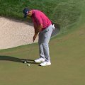 Scottie Scheffler moves to tie the hole with Nico Echavarria after a fan yelled out during the latter's swing.