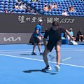 Mark Philippoussis stuns with a miraculous tweener winner during a Legends' Cup doubles match.