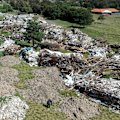 An estimated 4000 tonnes of construction rubble was brazenly dumped on Suji An's property by her former tenants.