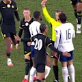 Kevin Danso is given a red card during Spurs' friendly against Chelsea.