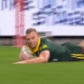 Kangaroos winger Tom Trbojevic races away to score a 90-metre intercept try against the Kiwis.