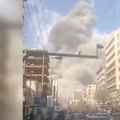 Video shows a huge plume of smoke rising over an avenue in the center of Iran’s capital Tehran on Saturday.
