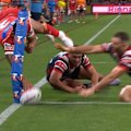 Jaymayne Isaako snatches the first points for the Dolphins with a try that league greats felt was over the sideline.