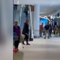 A 30-year-old man has been arrested and taken to hospital for assessment after allegedly carrying a knife around a shopping centre in Melbourne’s east.