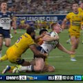 Tom Dearden lies on the ground in agony after two Eels players fell on his legs.