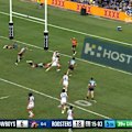 Three Cowboys drop to the ground as Sam Walker steps and scores.