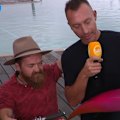 Aussie icons Ian Thorpe and Grant 'Scooter' Patterson reveal the first piece of the emblem for the 2032 Brisbane Olympics.