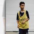 An elite Melbourne football academy has thrown its support behind a Melbourne schoolboy who was pulled onto train tracks in a horror accident.