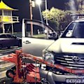 An alleged out-of-control driver ploughed into two pedestrians at the Gold Coast 500 before allegedly feeing the scene.