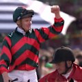 Punters have braved the elements to pack Flemington for Derby Day on a wet and windy start to the Melbourne Cup Carnival.
