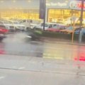 A 23-year-old motorcyclist is lucky to be alive after colliding with a car in wet conditions in Perth.