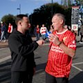 Fans react to the Manchester City cheating scandal before kick-off against Liverpool in the Premier League.