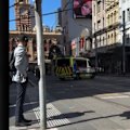 A teenager has been charged after a woman was hit by a car near Flinders Street in the middle of Melbourne.