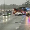 The M1 was closed south of Brisbane after a horror crash involving 10 cars.