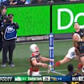 Jordan Samrani jumps over the Rabbitohs defence to score.