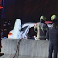 A man remains in hospital under police guard after allegedly stealing a Porsche before crashing into an oncoming car after a pursuit.