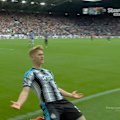 Lewis Hall extends the lead for Newcastle after Hull lost possession.