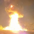 A truck driver is missing after a fiery crash that destroyed seven semi-trailers shut down a major transport route south of Sydney.