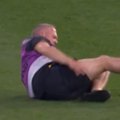 The Hawthorn physio slipped over twice as he tried to evade the play on Thursday night.