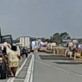 There are fears for dozens of people caught up in a bus crash on a major highway in Queensland.