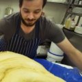 Hellas Cakes bakers including co-owner Andrew Kantaras, right, make Greek sweet bread for Easter with the help of family and staff.