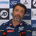 Geelong coach Chris Scott took aim at the Adelaide Oval crowd and called for a separate path to the field for coaches.