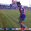 Knights prop Jacob Saifiti limps off the field in agony with a hamstring injury.