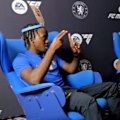 Wesley Fofana, Romeo Lavia, Jamie Gittens and Josh Acheampong try to guess the Chelsea legend cards stuck to their heads.