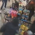 A bottle shop worker has used a baseball bat to fight off armed machete thugs who invaded his store.