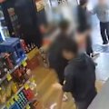 A 13-year-old boy has been arrested and accused of stealing and assaulting staff after allegedly storming a bottle shop in Sydney’s south-west.