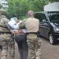 The Kremlin is accusing New Zealand of hiring a Russian citizen as a spy. New Zealand is questioning the accuracy of the Russian media reporting.